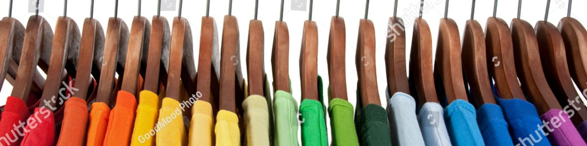 stock-photo-rainbow-colors-choice-of-casual-clothes-on-wooden-hangers-isolated-on-white-64449766__1_